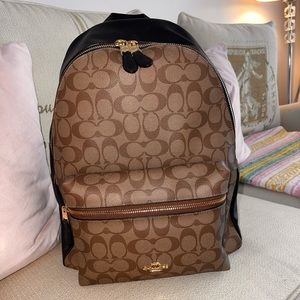 Coach charlie signature, canvas and black, leather backpack with gold